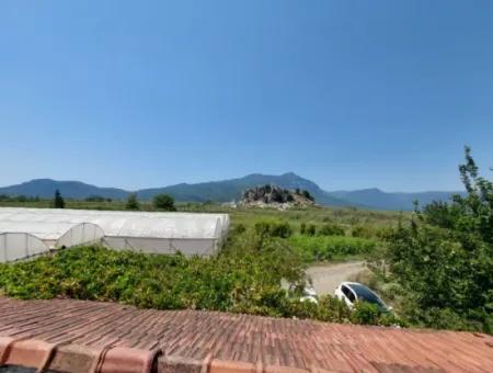 5 850 M2 Freistehendes Grundstück Mit Eigentumsurkunde Mit Seeblick Und Dorfhaus Zum Verkauf In Ortaca Eskiköy